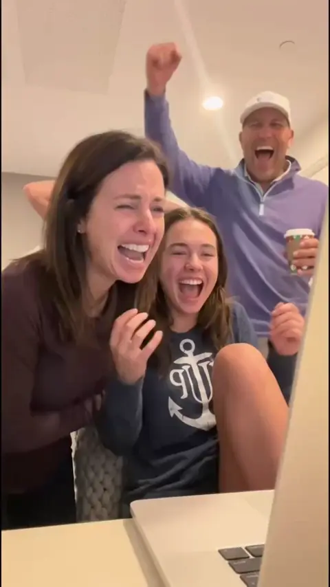 Student reacting to a college acceptance